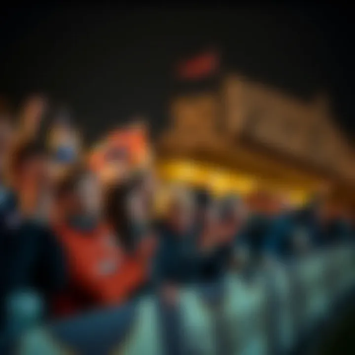 Fans cheering passionately during a local football match in Reykjavik.